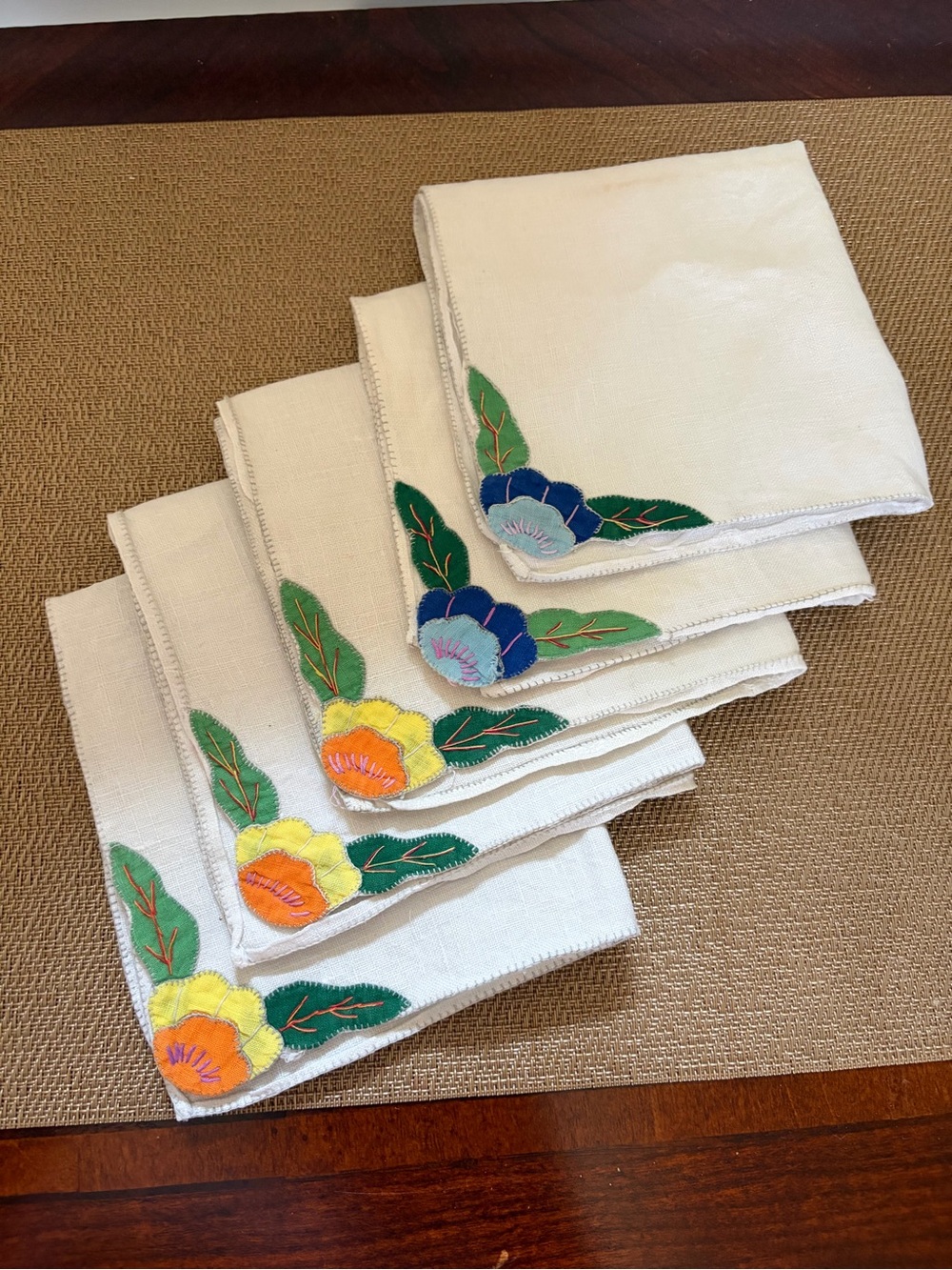 Five Vintage Cocktail size napkins with flower detail in corner, blue, yellow